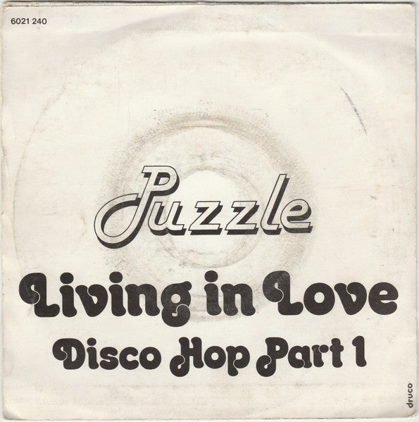 Puzzle - Living In Love 34853 Vinyl Singles Vinyl Goed / Hoes Goed