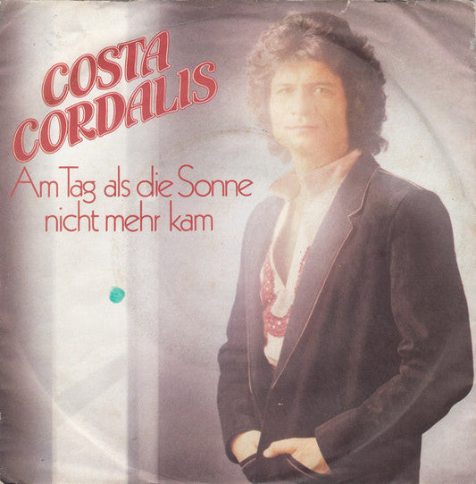 Costa Cordalis - Am Tag Als Die Sonne Nicht Mehr Kam 36683 Vinyl Singles Vinyl Goed / Hoes Goed