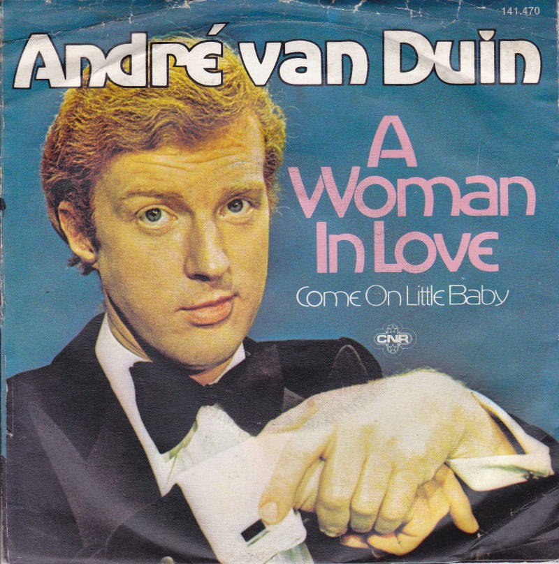 André van Duin - A Woman In Love 43335 Vinyl Singles Vinyl Zeer Goed / Hoesje Goed "VINYLSINGLES.NL"