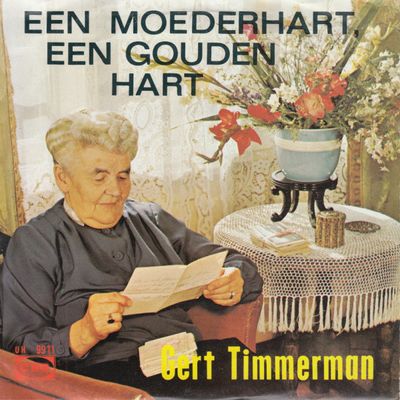 Gert Timmerman - Een Moederhart, Een Gouden Hart Vinyl Singles Vinyl Zeer Goed / Hoesje Goed "VINYLSINGLES.NL"