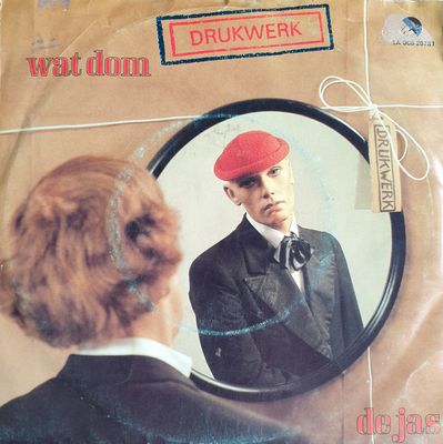 Drukwerk - Wat Dom Vinyl Singles Vinyl Zeer Goed / Hoesje Goed "VINYLSINGLES.NL"