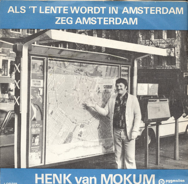 Henk van Mokum - Als't Het Lente Wordt In Amsterdam Vinyl Singles Vinyl Zeer Goed / Hoesje Goed "VINYLSINGLES.NL"