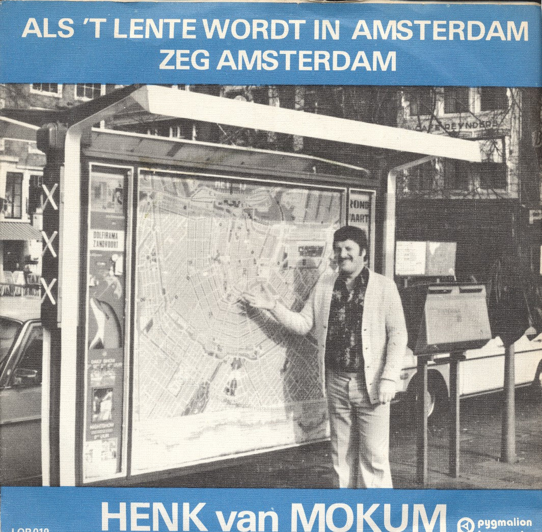 Henk van Mokum - Als 't Het Lente Wordt In Amsterdam Vinyl Singles Vinyl Zeer Goed / Hoesje Goed "VINYLSINGLES.NL"