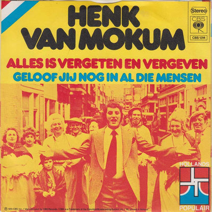Henk Van Mokum - Geloof Jij Nog In Al Die Mensen Vinyl Singles Vinyl Zeer Goed / Hoesje Goed "VINYLSINGLES.NL"