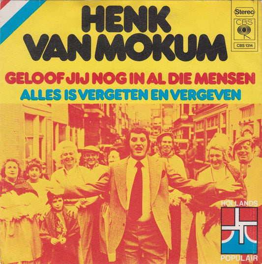 Henk Van Mokum - Geloof Jij Nog In Al Die Mensen Vinyl Singles Vinyl Zeer Goed / Hoesje Goed "VINYLSINGLES.NL"