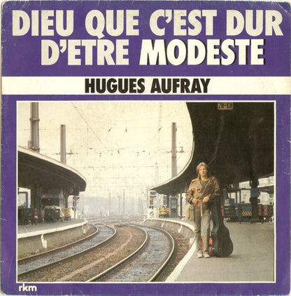 Hugues Aufray - Dieu Que C’est Dur D’être Modeste Vinyl Singles Vinyl Zeer Goed / Hoesje Goed "VINYLSINGLES.NL"