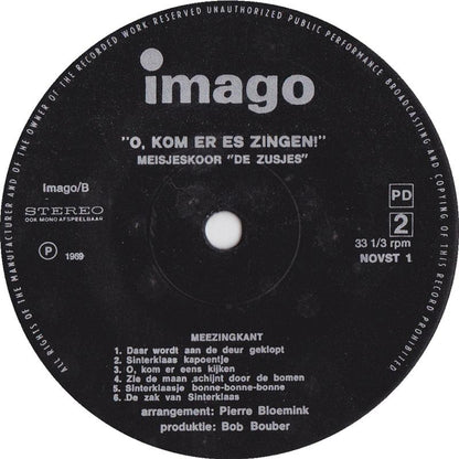 Meisjeskoor De Zusjes - O Kom Er Es Zingen 34799 Vinyl Singles Vinyl Goed / Hoes Goed